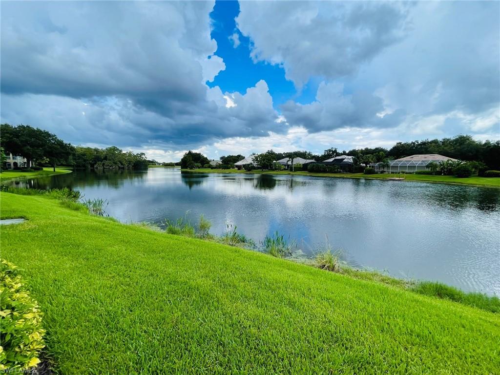 224 Napa Ridge Road East, Unit 12 Naples, FL 34119 - Photo 6 of 33 a view of a lake
