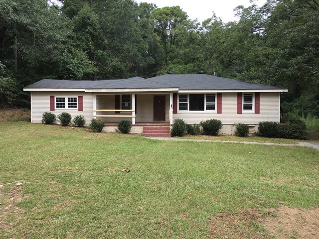 6395 Skipper Road Macon, GA 31216 - Photo 1 of 10 front view of a house with a yard