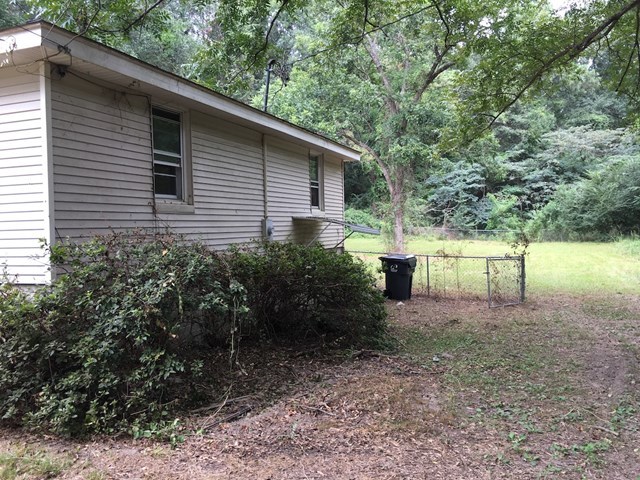 6395 Skipper Road Macon, GA 31216 - Photo 2 of 10 a view of a back yard