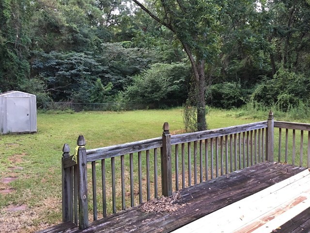 6395 Skipper Road Macon, GA 31216 - Photo 9 of 10 a view of a wooden roof deck