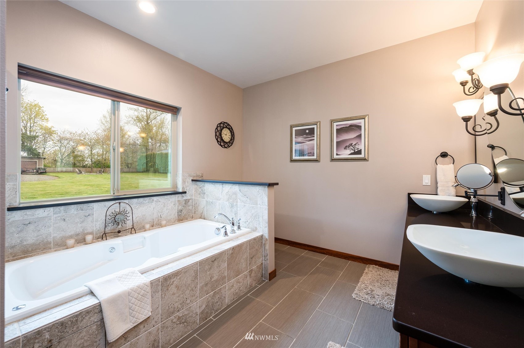 1060 Carpenter Road Bellingham, WA 98226 - Photo 14 of 37 a bathroom with a bathtub and a sink