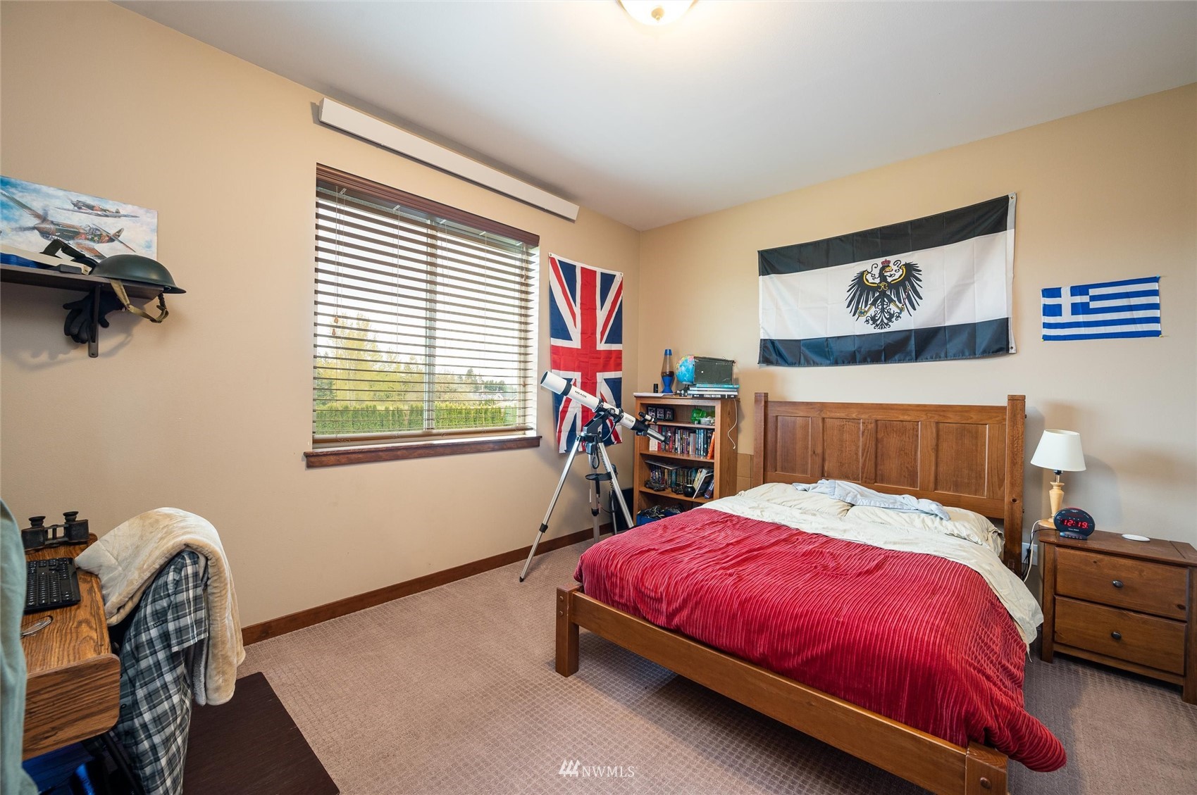 1060 Carpenter Road Bellingham, WA 98226 - Photo 21 of 37 a bed room with a bed and a chair