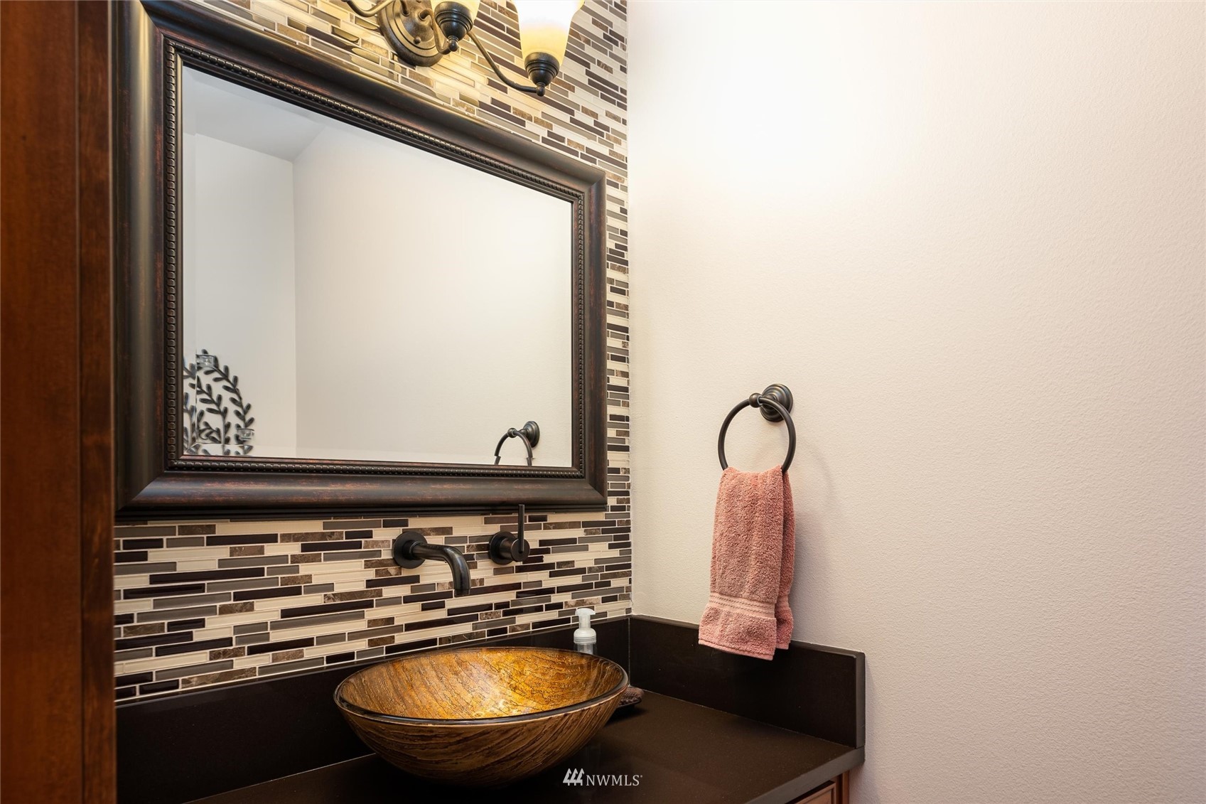 1060 Carpenter Road Bellingham, WA 98226 - Photo 24 of 37 a bathroom with a sink and a mirror