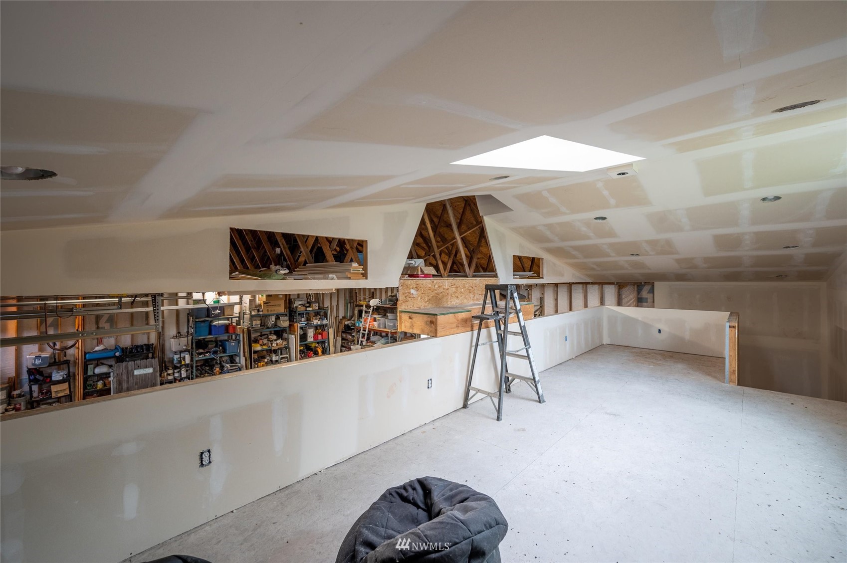 1060 Carpenter Road Bellingham, WA 98226 - Photo 33 of 37 a living room with lots of furniture and white walls