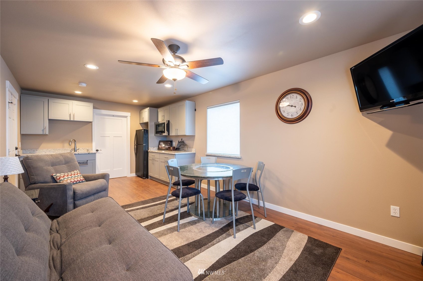 1060 Carpenter Road Bellingham, WA 98226 - Photo 34 of 37 a living room with furniture and a flat screen tv