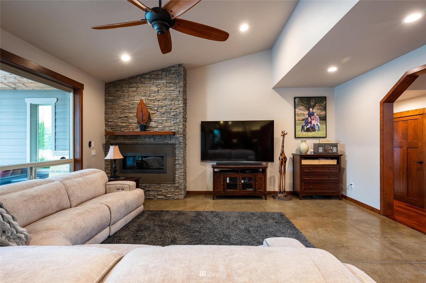 1060 Carpenter Road Bellingham, WA 98226 - Photo 4 of 37 a living room with furniture and a flat screen tv