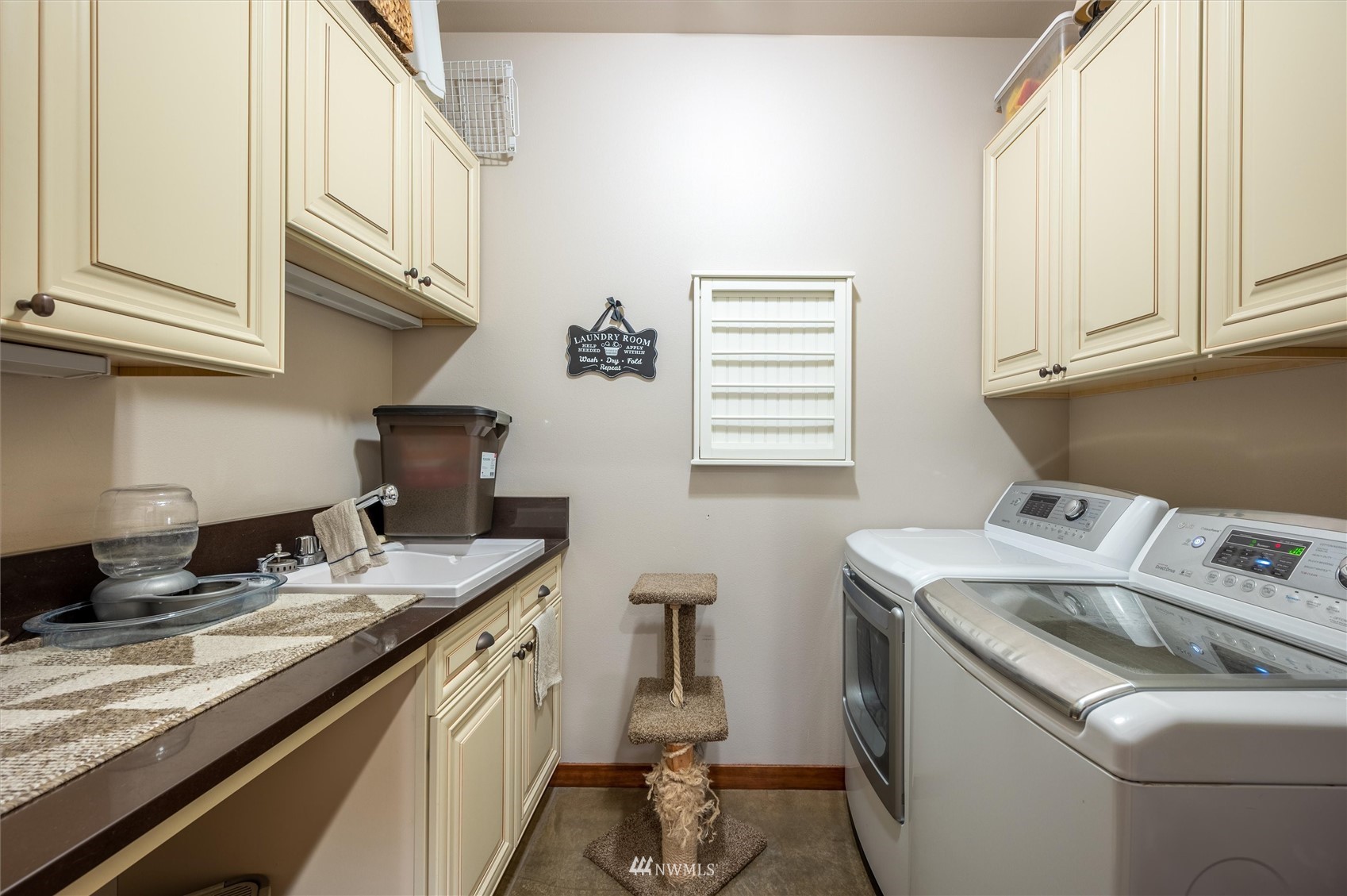 1060 Carpenter Road Bellingham, WA 98226 - Photo 10 of 37 a kitchen with a sink stove and cabinets