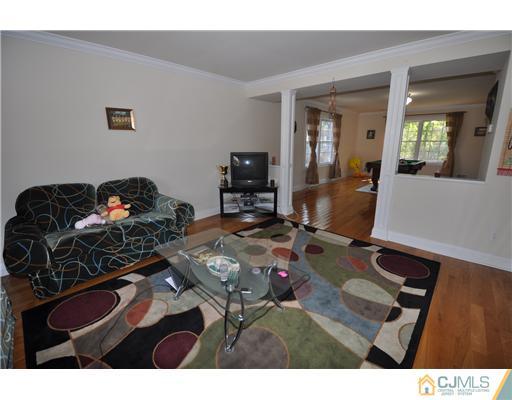 31 Parkerson Road Edison, NJ 08817 - Photo 2 of 6 a living room with furniture and wooden floor