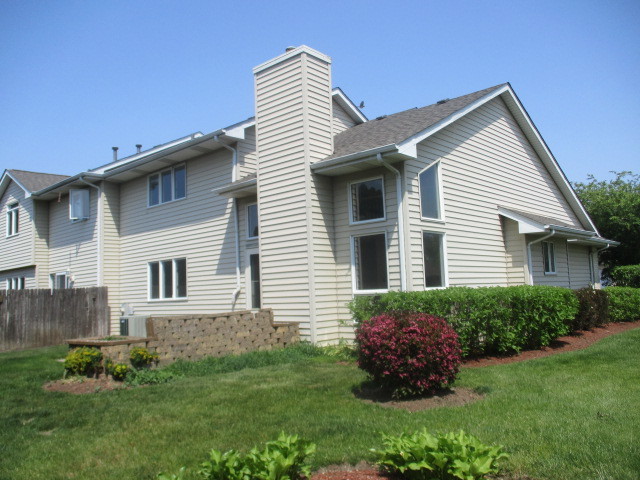 1901 Calla Drive Joliet, IL 60435 - Photo 26 of 27 a house view with a garden space