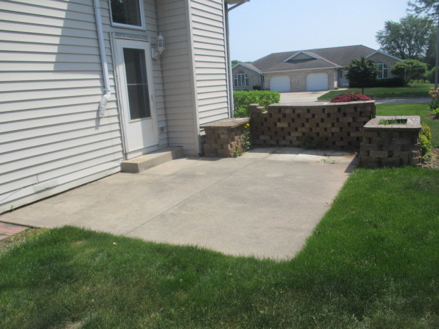 1901 Calla Drive Joliet, IL 60435 - Photo 27 of 27 a front view of a house with a garden