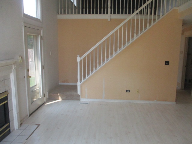 1901 Calla Drive Joliet, IL 60435 - Photo 3 of 27 a view of an empty room with stairs