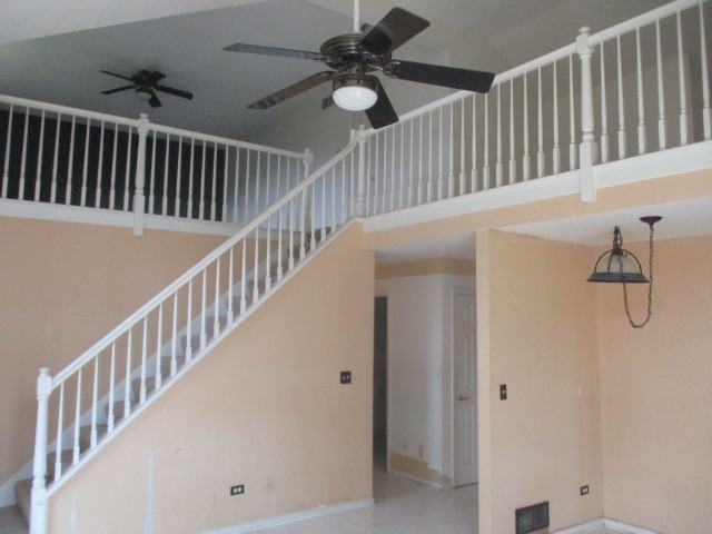 1901 Calla Drive Joliet, IL 60435 - Photo 4 of 27 a view of staircase with railing and white walls