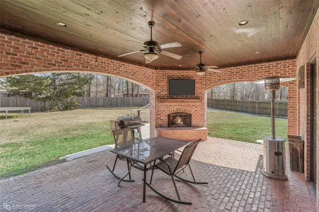 an aerial view of residential house with outdoor space