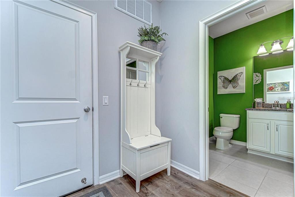 5703 Colony Glen Road Lithia, FL 33547 - Photo 21 of 53 a bathroom with a toilet sink and mirror