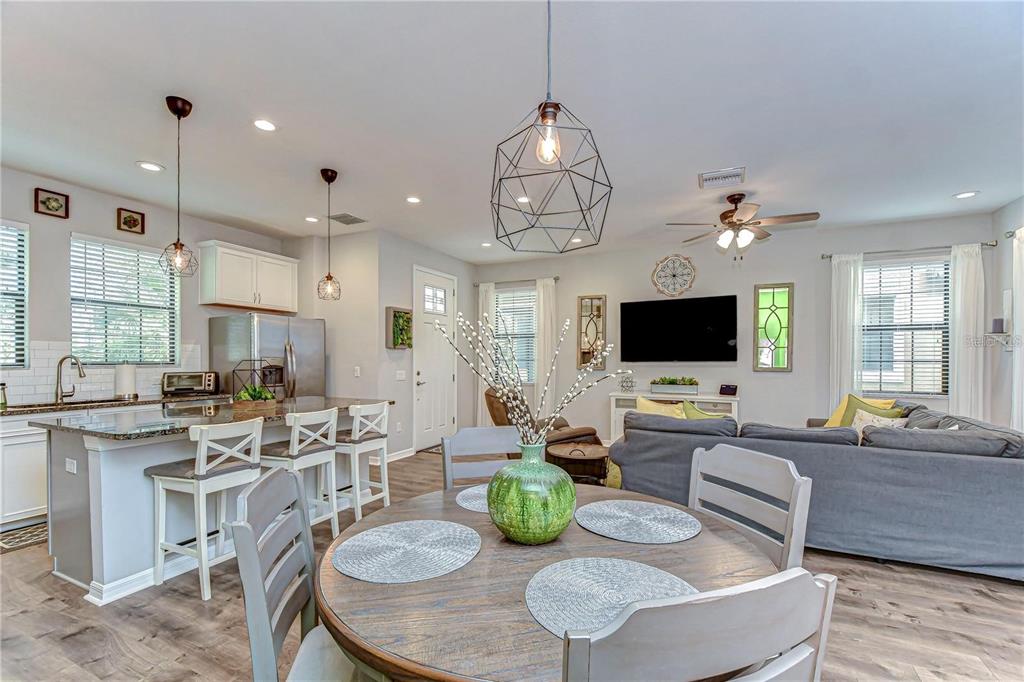 5703 Colony Glen Road Lithia, FL 33547 - Photo 6 of 53 a living room with fireplace furniture and a flat screen tv