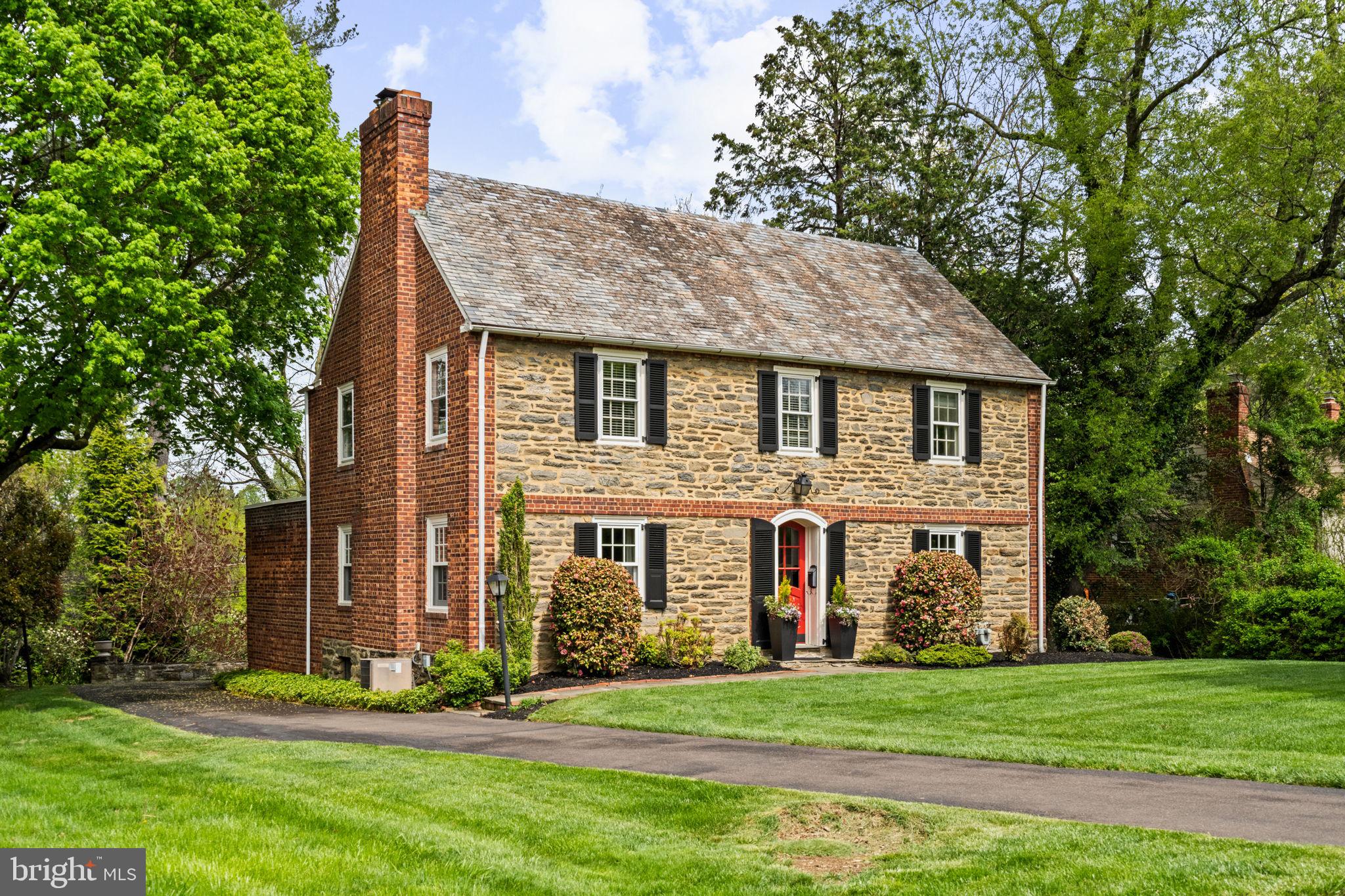 7901 Cobden Road Glenside, PA 19038 - Photo 2 of 43 a front view of a house with a yard