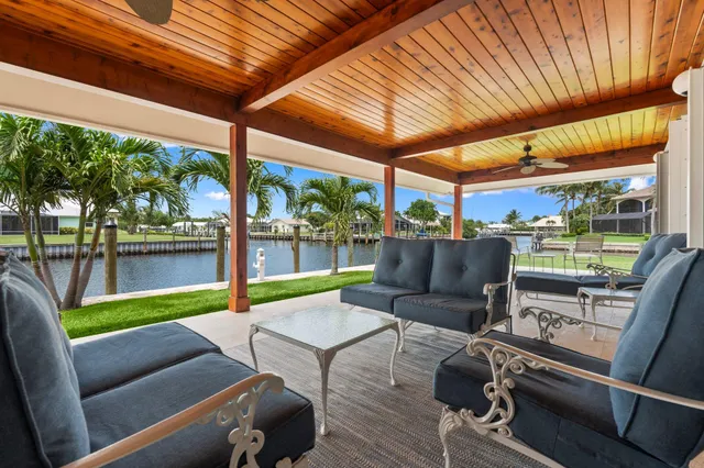 a view of swimming pool with a patio