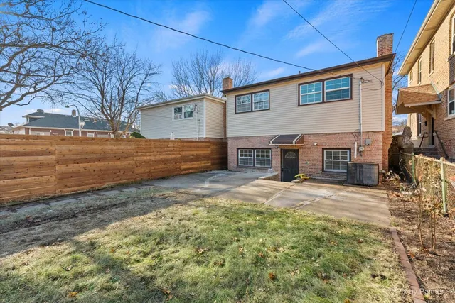 a view of a backyard of the house