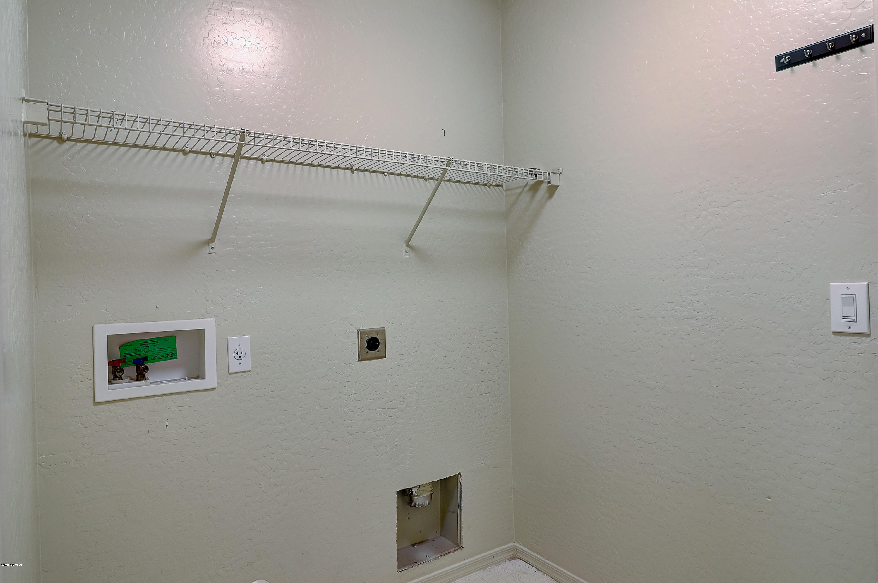 8461 West Riley Road Tolleson, AZ 85353 - Photo 15 of 25 a bathroom with a shower and vanity