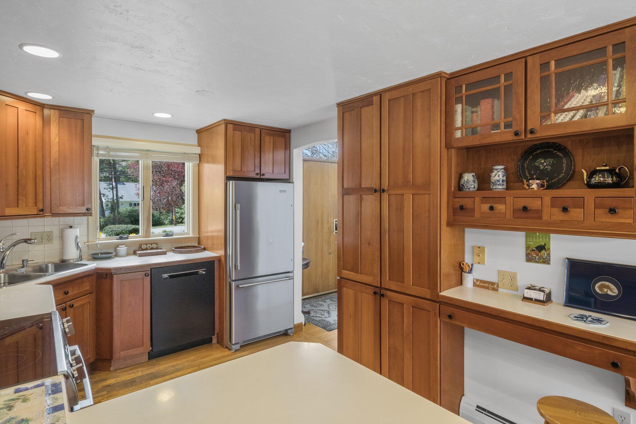 1363 Old Post Road Marstons Mills, MA 02648 - Photo 13 of 41 a kitchen with stainless steel appliances granite countertop a refrigerator and a sink