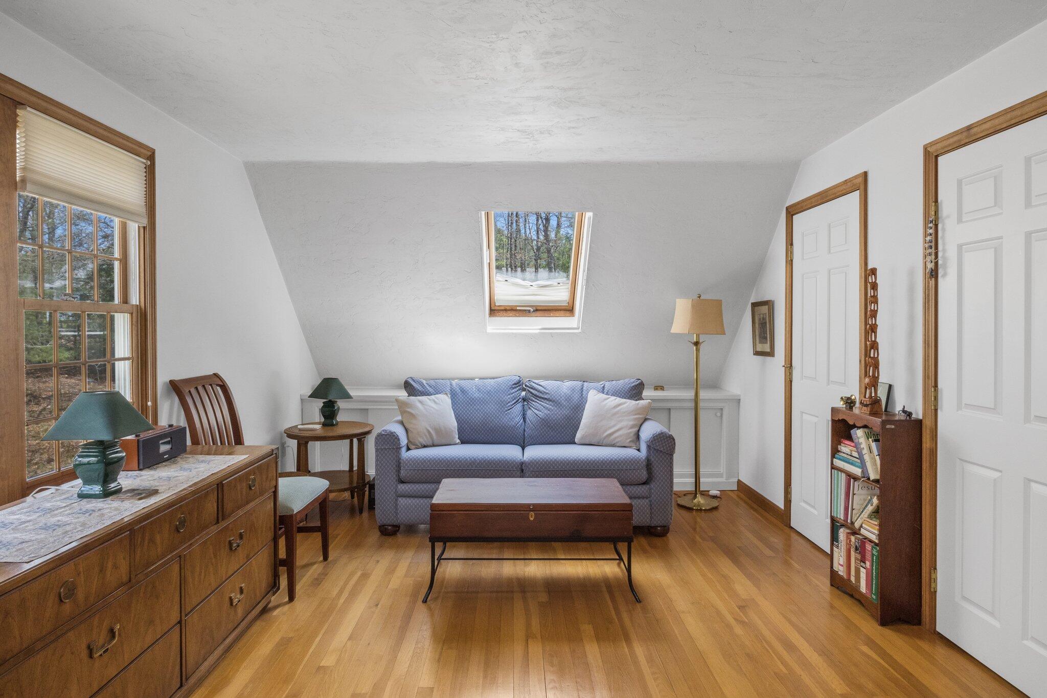 1363 Old Post Road Marstons Mills, MA 02648 - Photo 23 of 41 a living room with furniture and a wooden floor