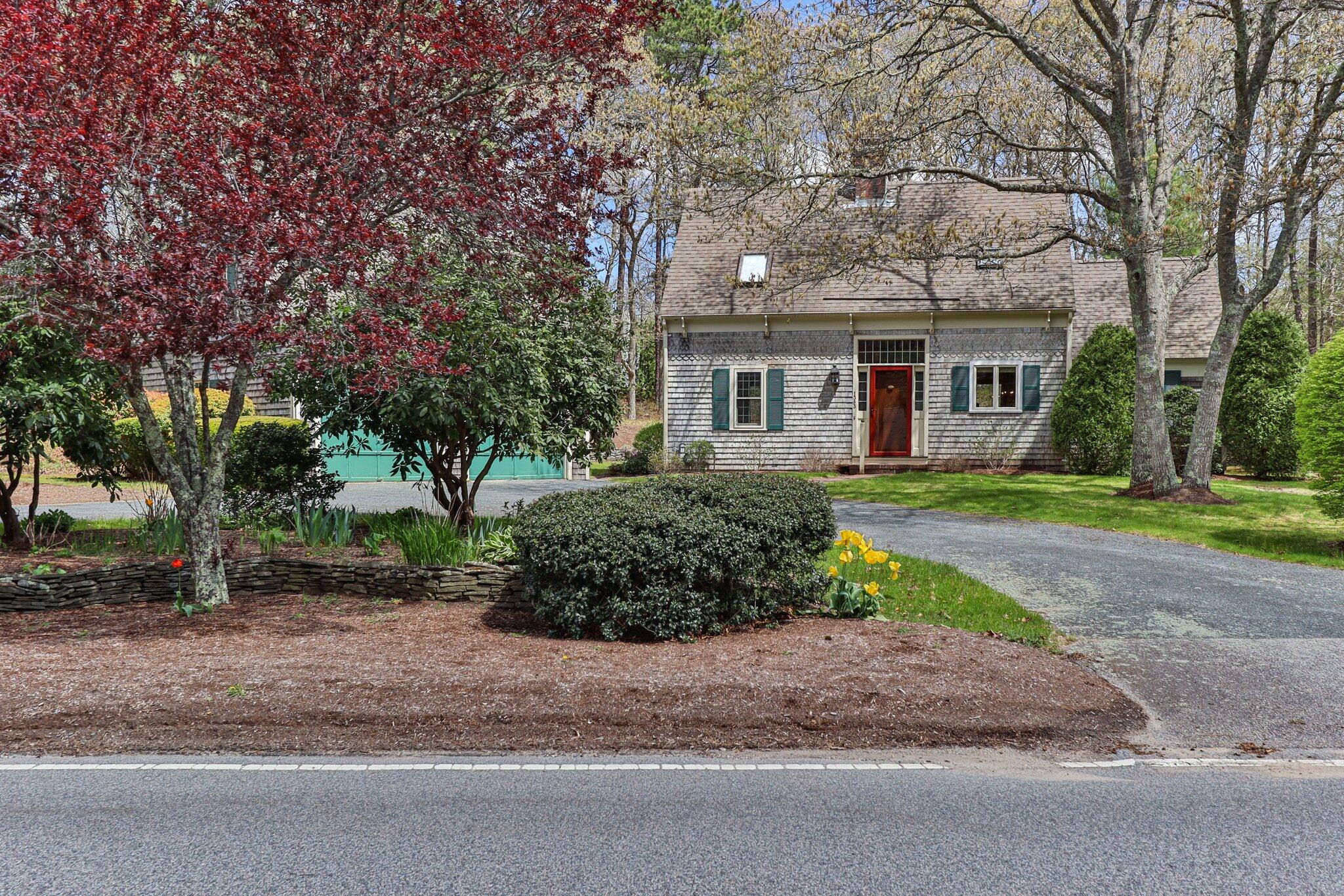 1363 Old Post Road Marstons Mills, MA 02648 - Photo 3 of 41 a front view of house with yard and green space