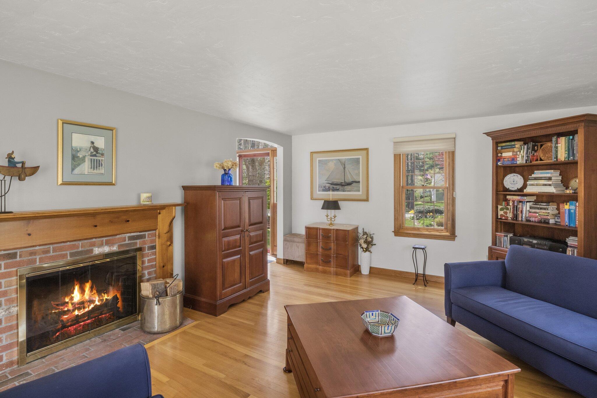 1363 Old Post Road Marstons Mills, MA 02648 - Photo 32 of 41 a living room with furniture and a fireplace