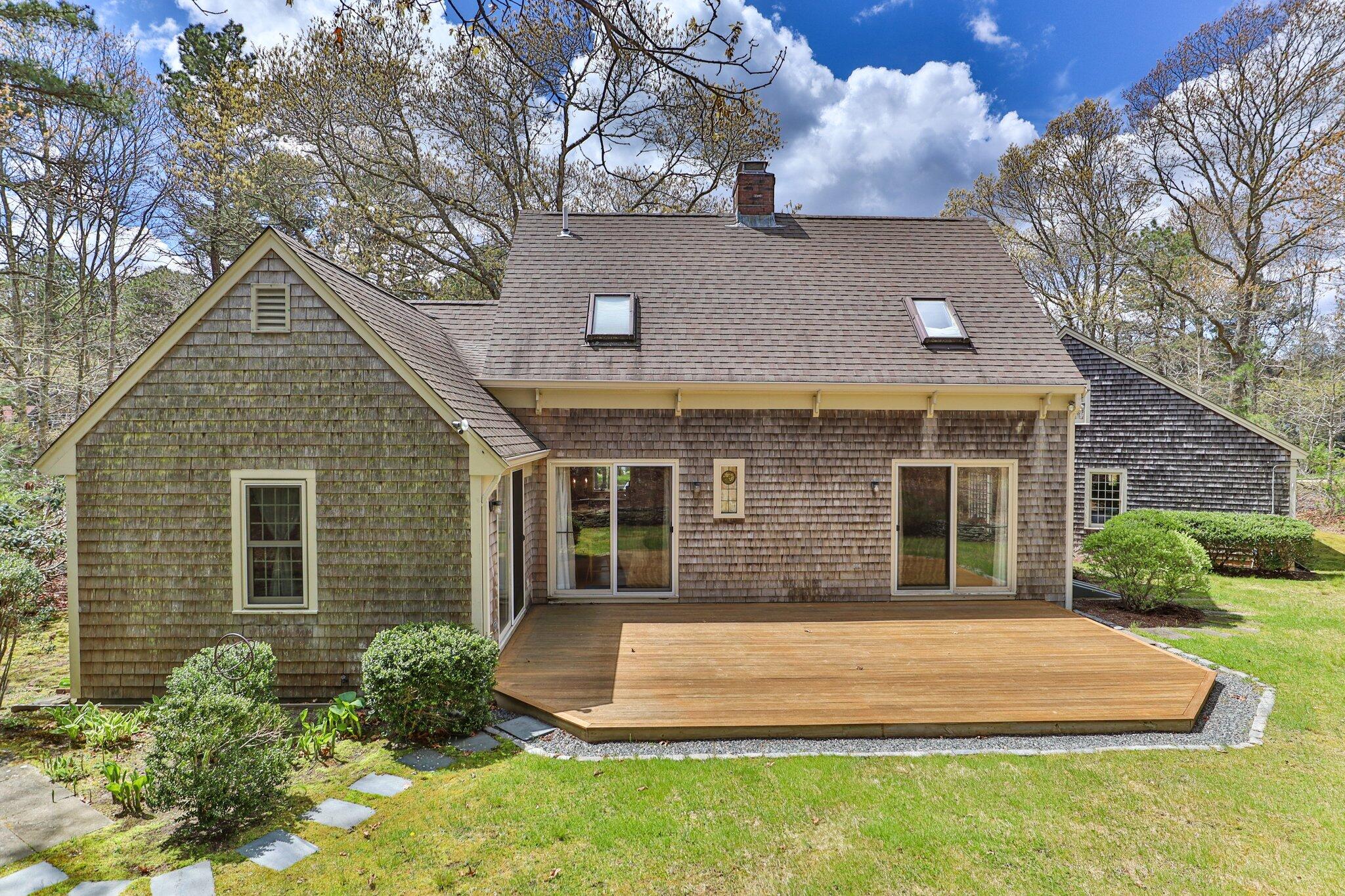 1363 Old Post Road Marstons Mills, MA 02648 - Photo 40 of 41 a front view of a house with a yard