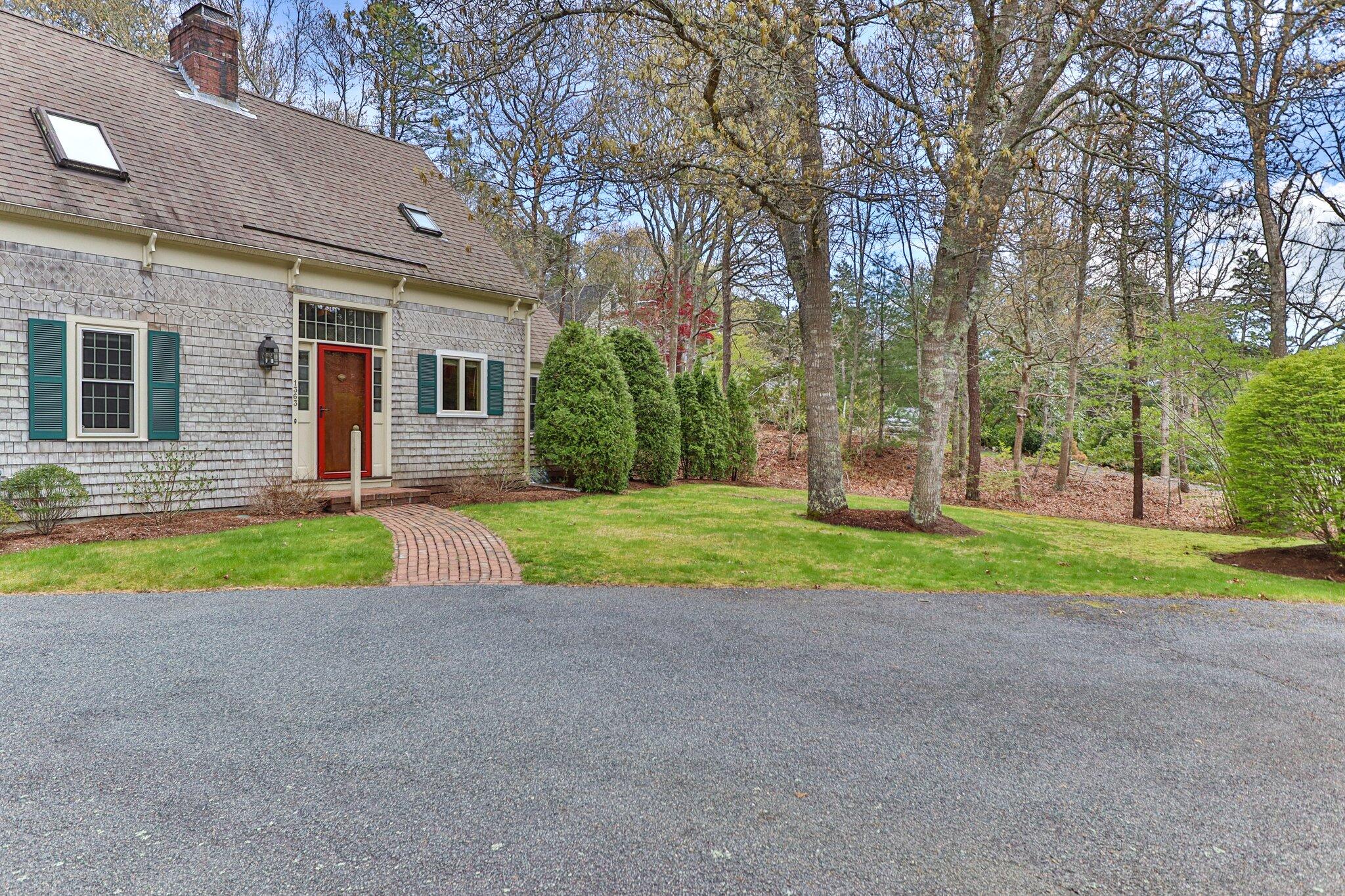1363 Old Post Road Marstons Mills, MA 02648 - Photo 6 of 41 front view of a house with a yard and an trees