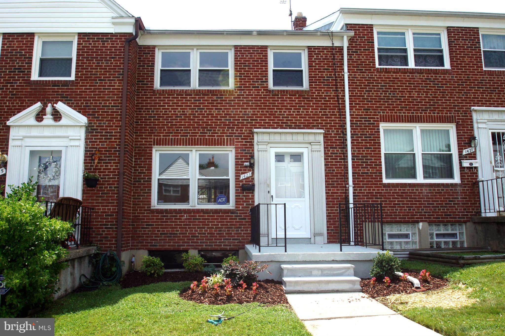 1423 Langford Road Baltimore, MD 21207 - Photo 1 of 30 a front view of a house with garden