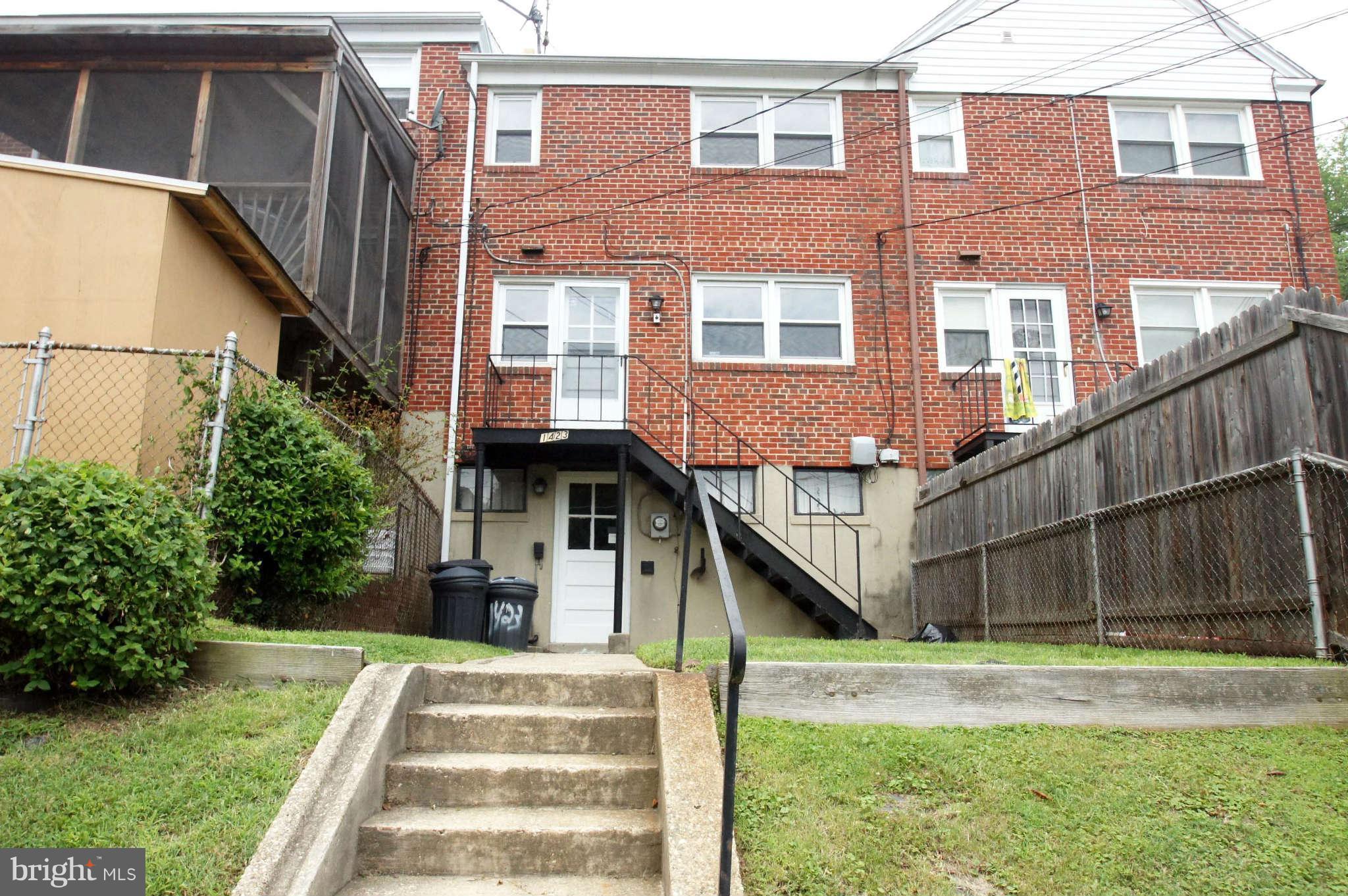 1423 Langford Road Baltimore, MD 21207 - Photo 2 of 30 a front view of a house with a yard balcony