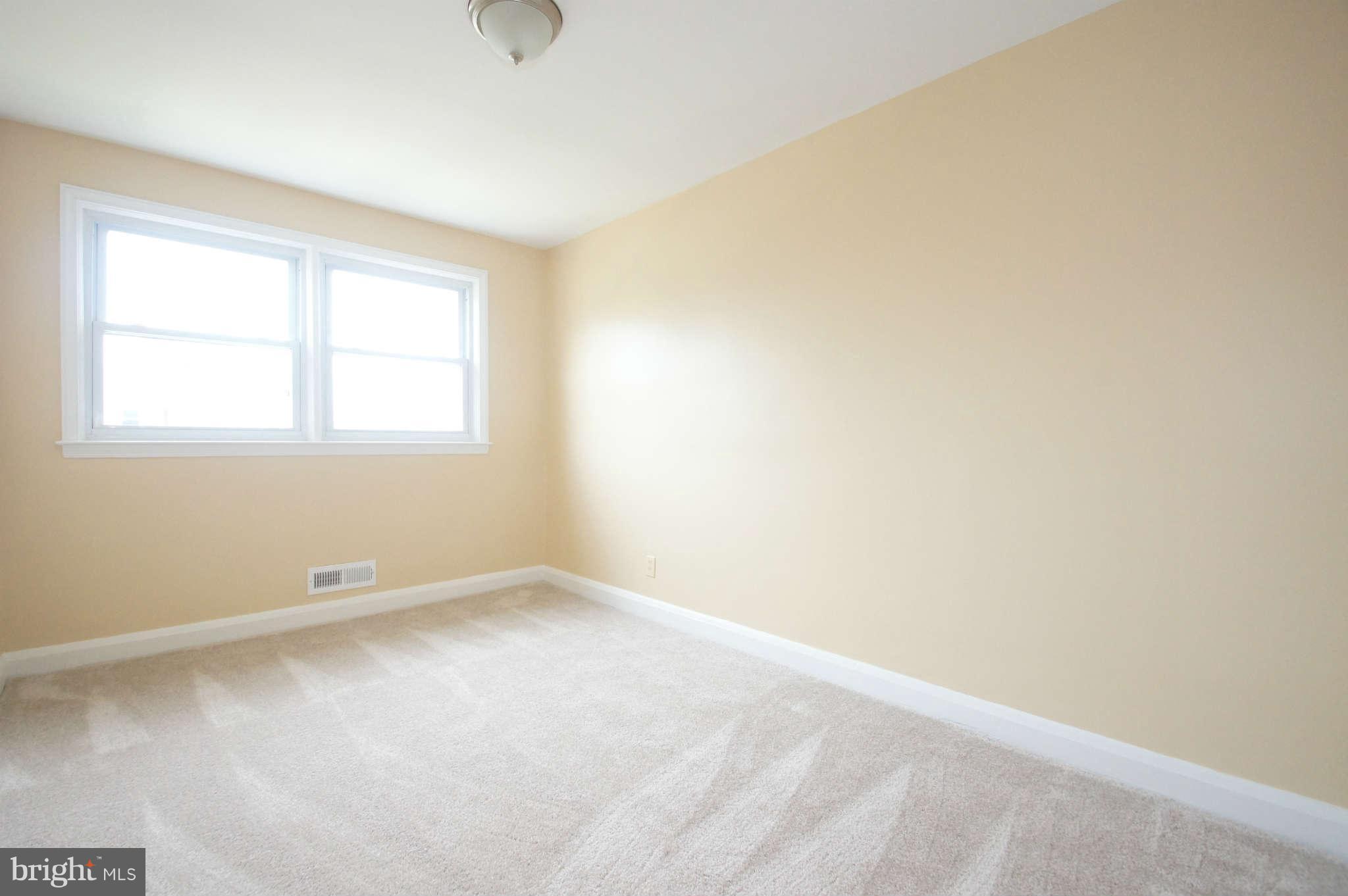 1423 Langford Road Baltimore, MD 21207 - Photo 17 of 30 an empty room with a window