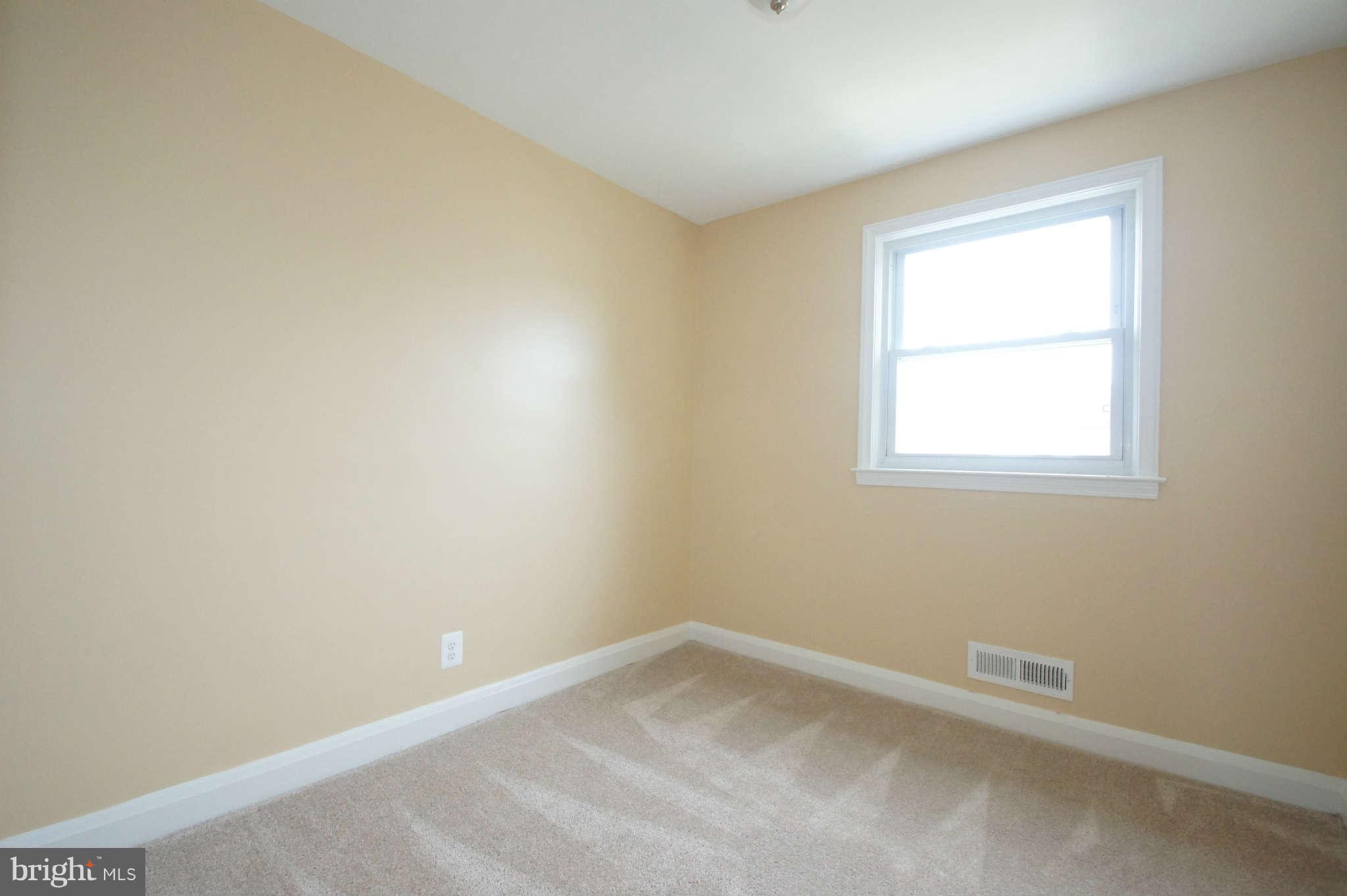1423 Langford Road Baltimore, MD 21207 - Photo 18 of 30 an empty room with a window