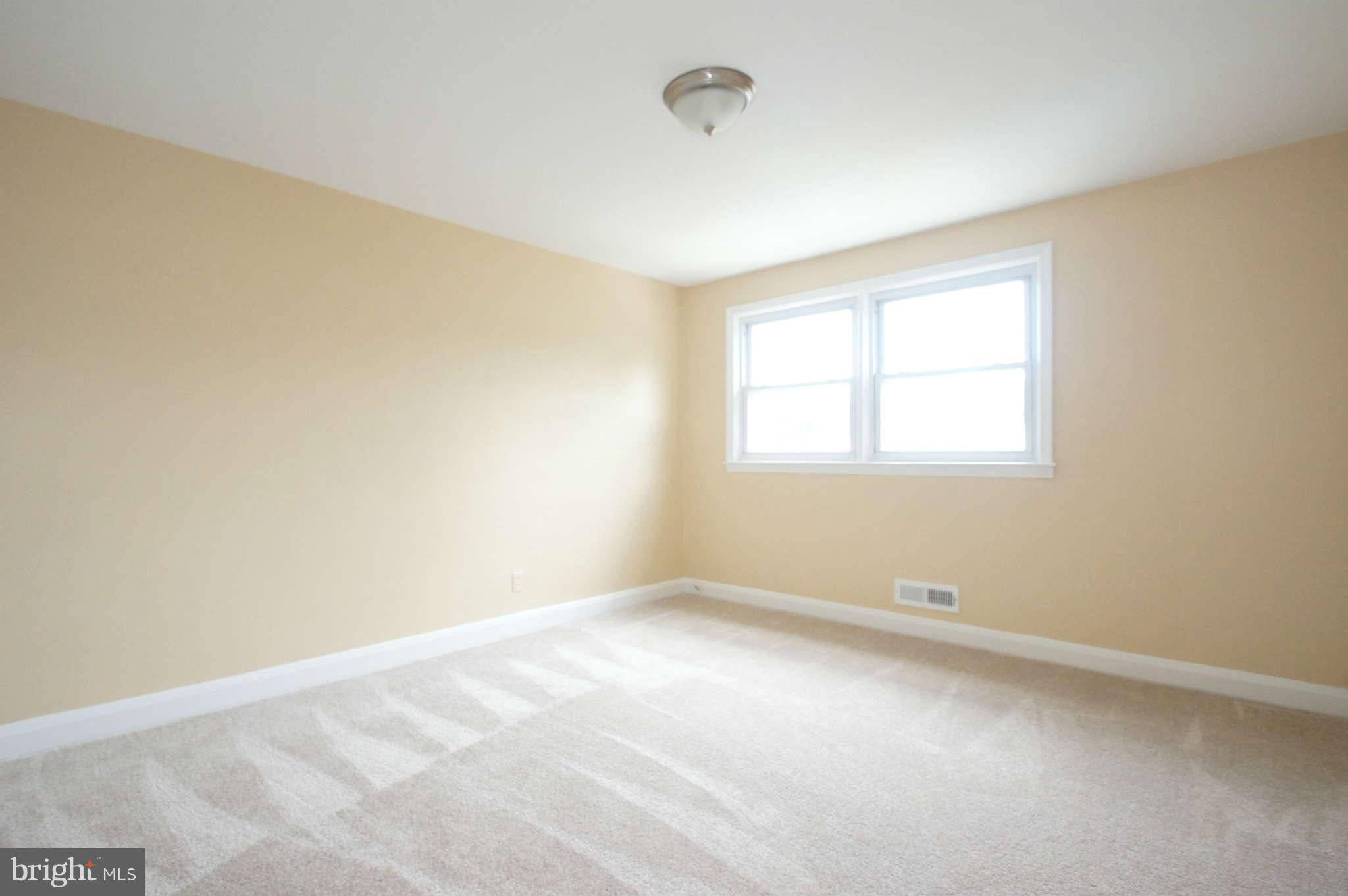 1423 Langford Road Baltimore, MD 21207 - Photo 20 of 30 an empty room with a window