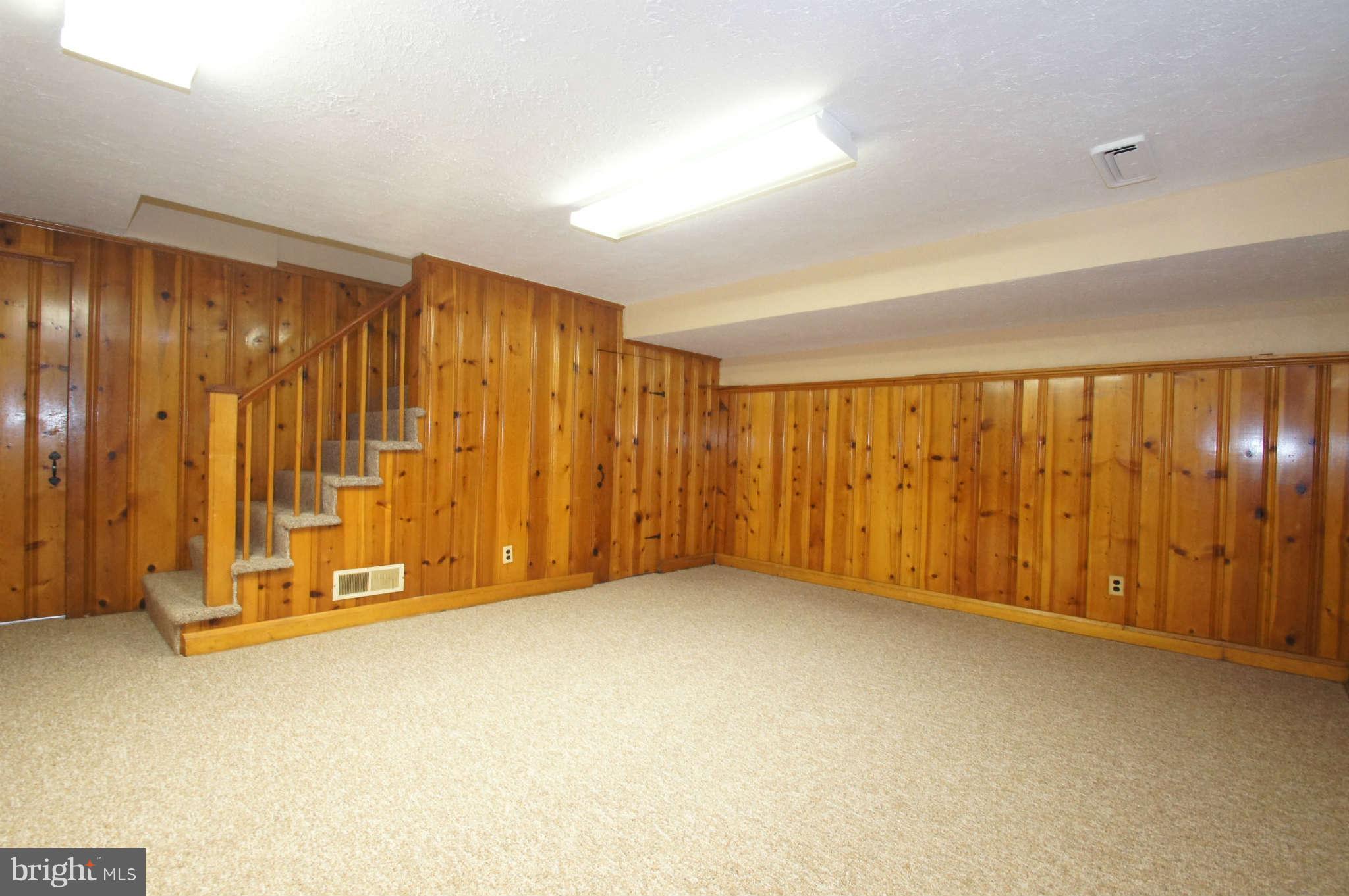 1423 Langford Road Baltimore, MD 21207 - Photo 30 of 30 an empty room with a door