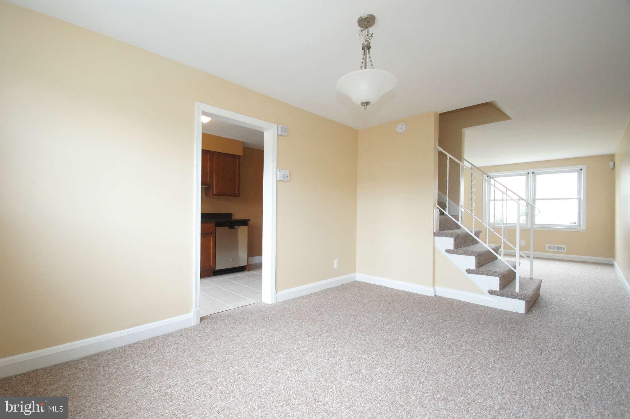 1423 Langford Road Baltimore, MD 21207 - Photo 7 of 30 a view of an empty room with a window