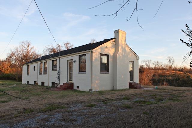 2351 Neelys Bend Road Madison, TN 37115 - Photo 10 of 14 Rear of home you see as you drive up the driveway. The front of the home faces the river.
