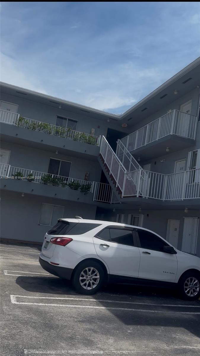1852 Southwest 7th Street, Unit 109 Miami, FL 33135 - Photo 17 of 21 a car parked in a parking garage