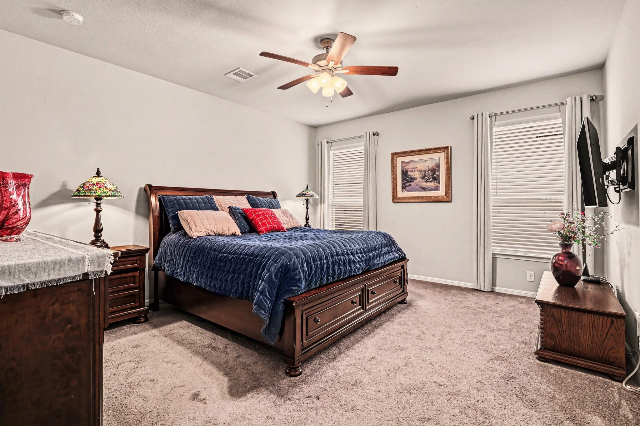 320 Red Maple Lane Conroe, TX 77304 - Photo 10 of 24 Oversized primary suite with spacious layout and separation from secondary bedrooms.