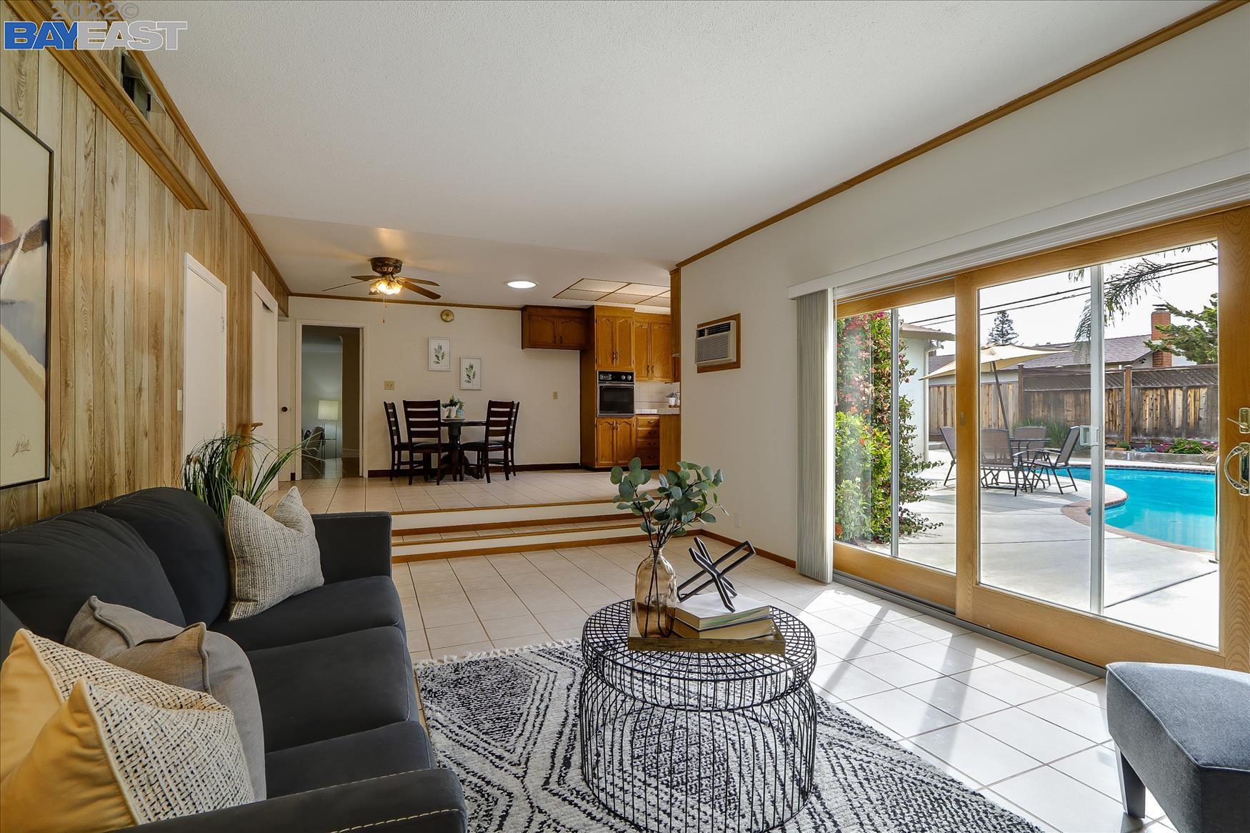 1548 Dianda Drive Concord, CA 94521 - Photo 1 of 1 a living room with furniture and a large window