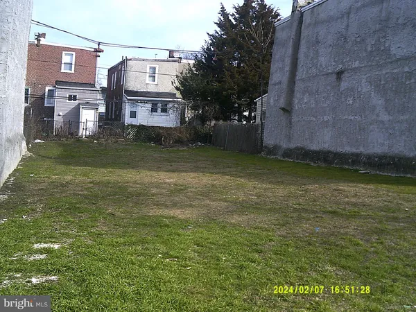a view of a big yard next to a building