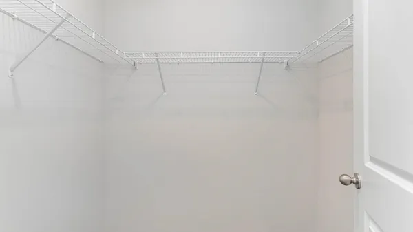 a view of a room with racks on the wall