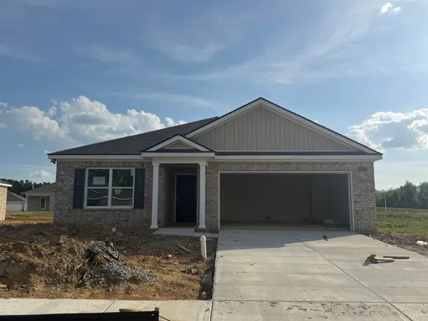 a open kitchen with stainless steel appliances granite countertop a white cabinets stove a sink and a refrigerator
