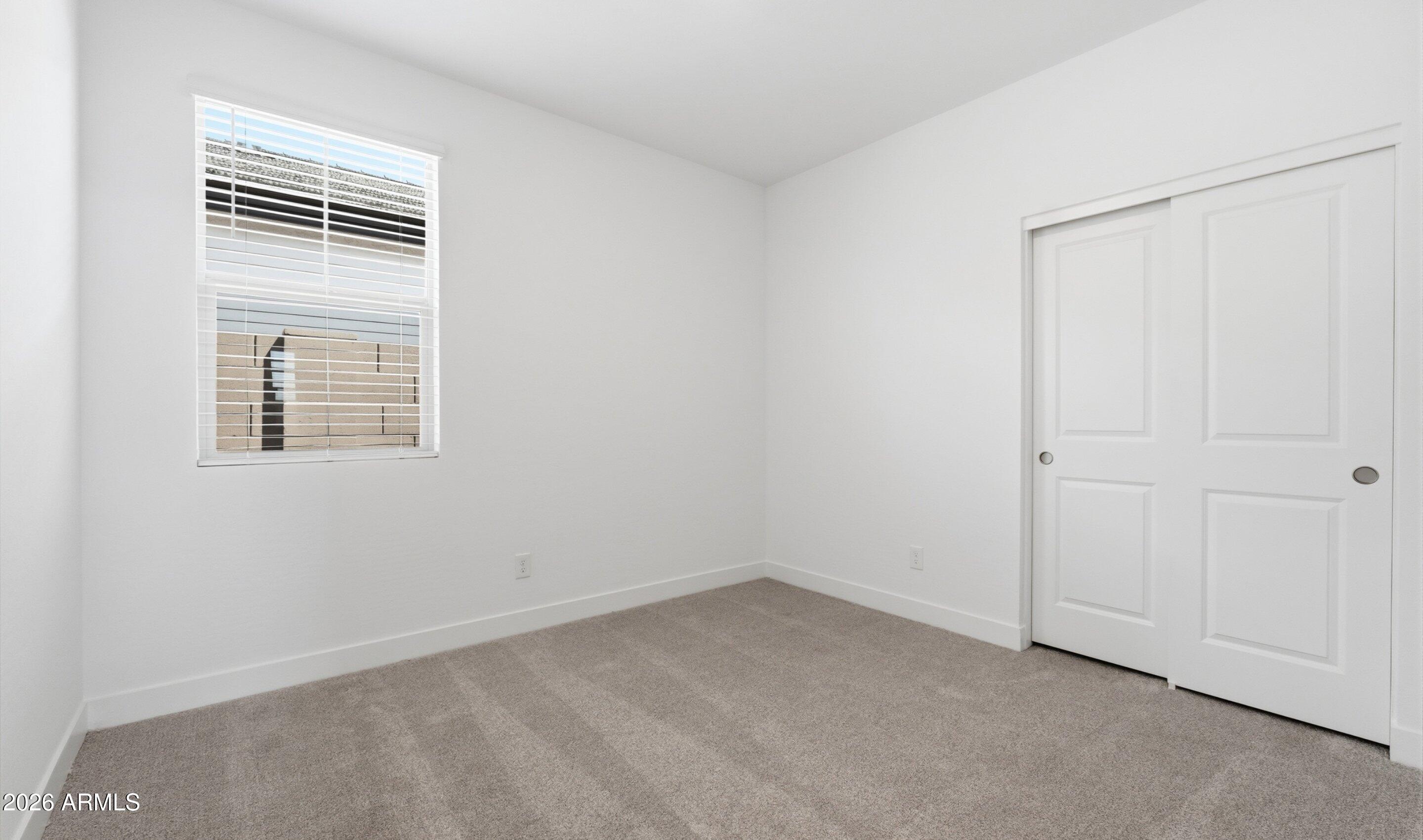 7779 West Sands Road Glendale, AZ 85303 - Photo 15 of 37 an empty room with a window