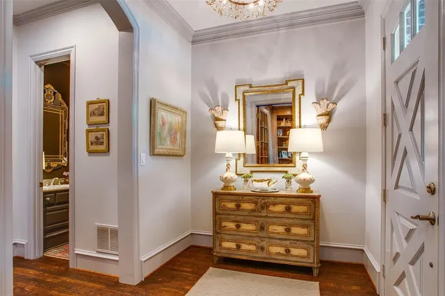 a view of a hallway with front door