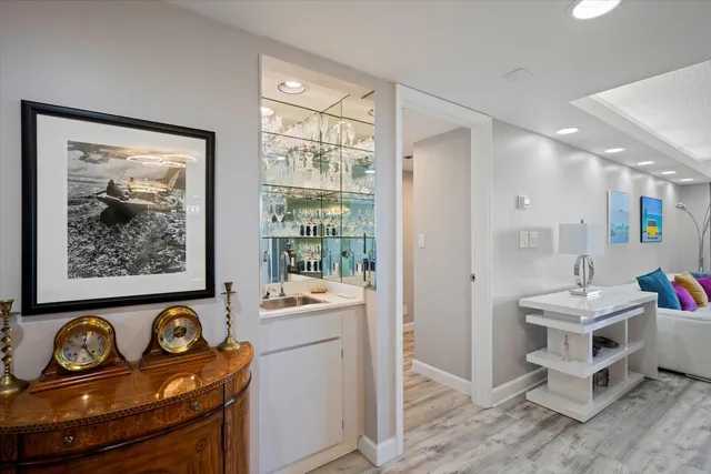 a bathroom with a sink and a window
