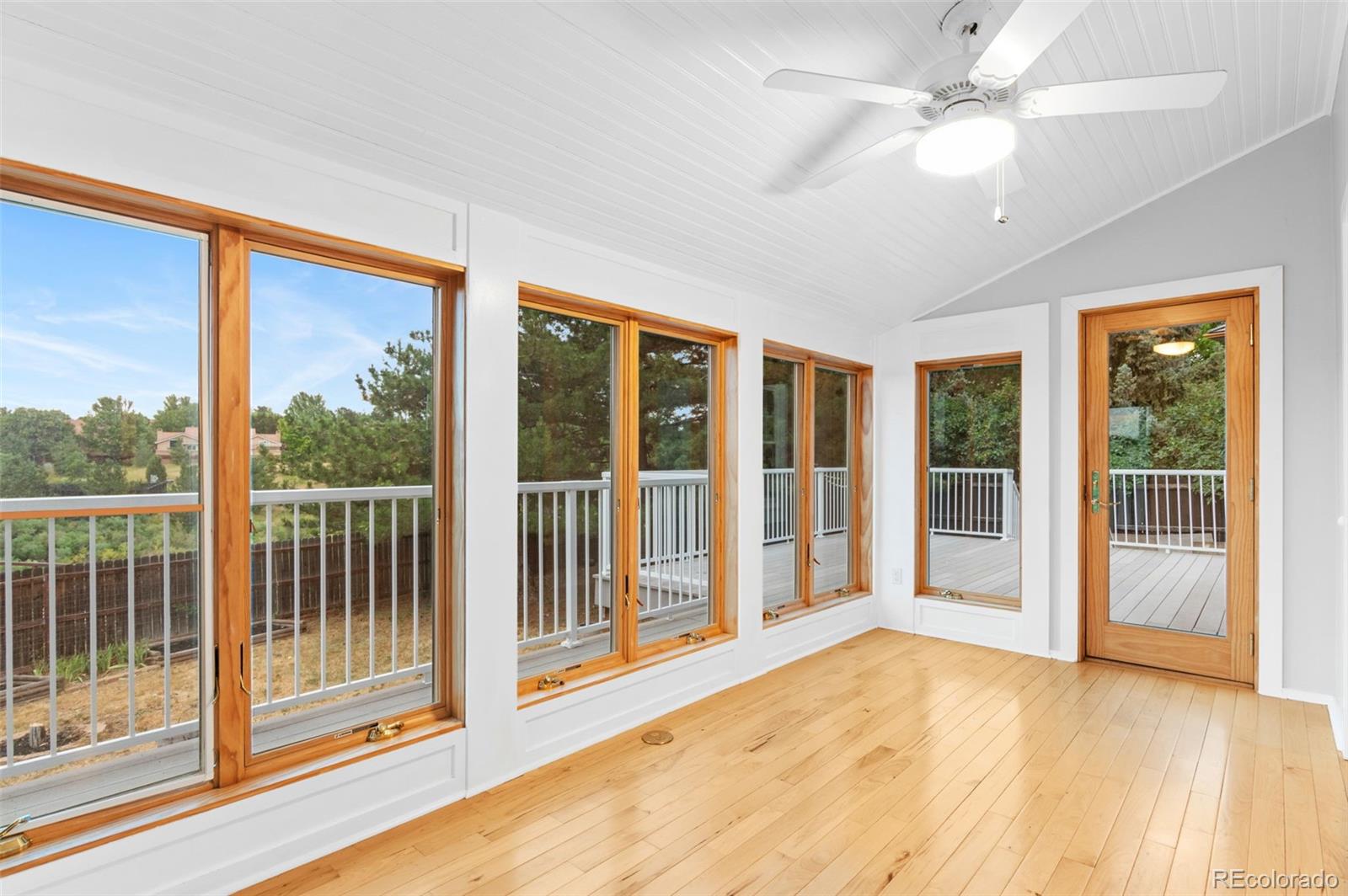 8385 Sweet Water Road Lone Tree, CO 80124 - Photo 16 of 50 a view of an empty room with glass door