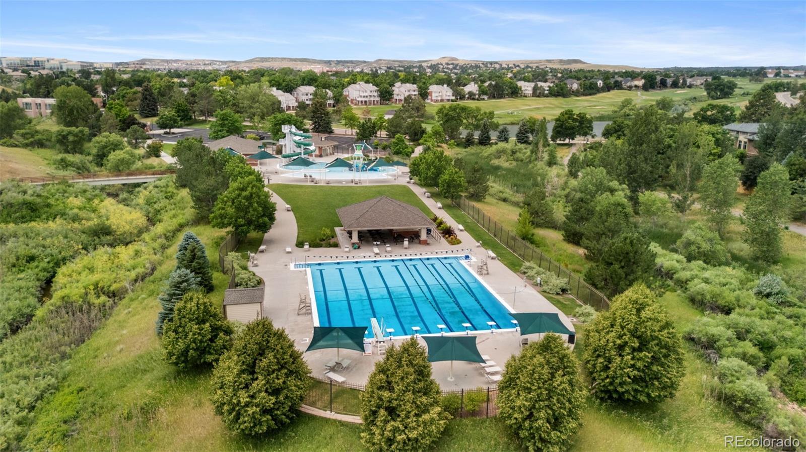 8385 Sweet Water Road Lone Tree, CO 80124 - Photo 46 of 50 a view of a city and mountains