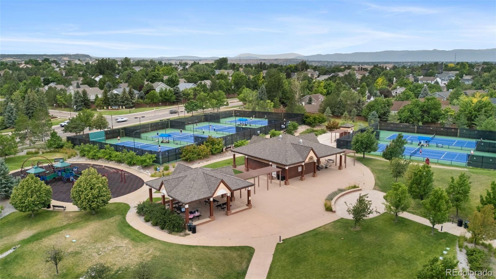 8385 Sweet Water Road Lone Tree, CO 80124 - Photo 47 of 50 an aerial view of a house with garden space and outdoor space