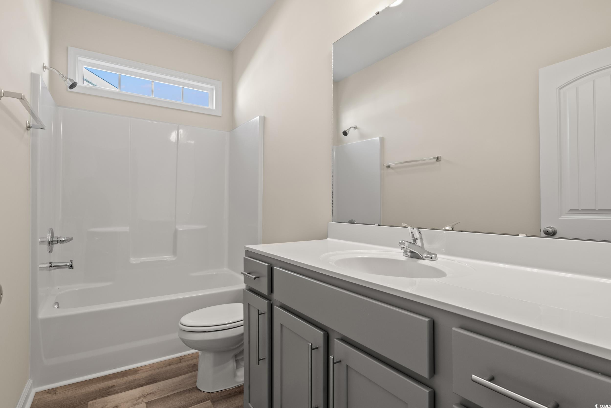 316 Lakota Loop Longs, SC 29568 - Photo 14 of 17 Full bathroom with toilet, vanity, shower combina